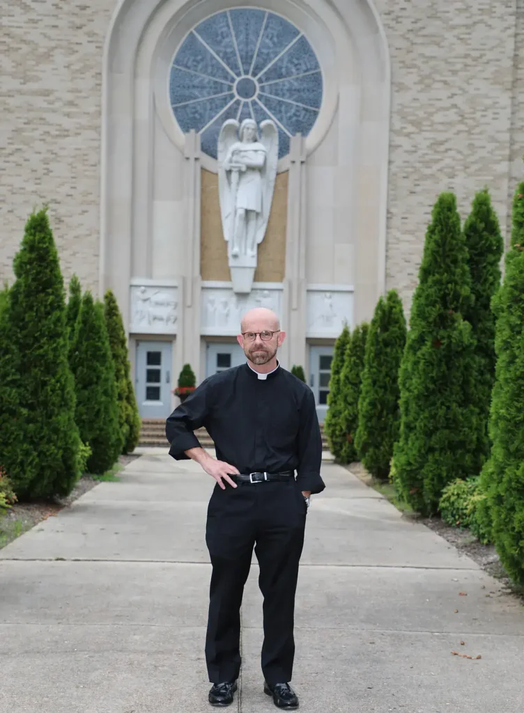 Father Ben Bradshaw in front of St. Michael Catholic Church Memphis, TN